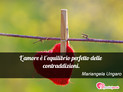 Immagine con frase amore di Mariangela Ungaro - L'amore  l'equilibrio perfetto delle...