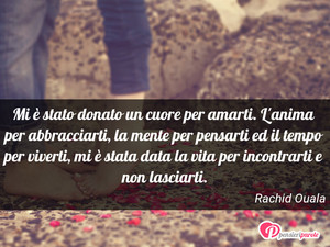 Immagine con frase di Rachid Ouala - Mi è stato donato un cuore per amarti. L'anima...
