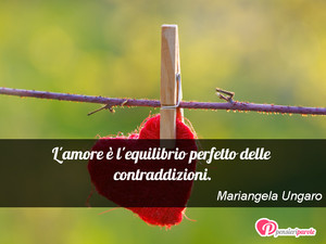 Immagine con frase di Mariangela Ungaro - L'amore  l'equilibrio perfetto delle...