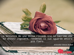 Immagine con frase di Antonella Celeste Buttelli - La bellezza di una donna risiede tra le...