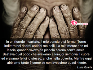 Immagine con frase di Lucia Quarta - In un ricordo incartato, il mio pensiero si...